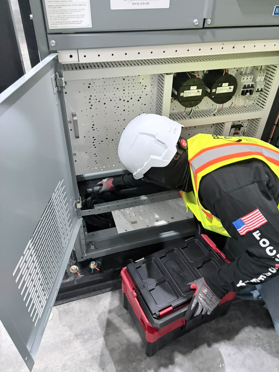 Prestige technician cleaning inside approved data center equipment